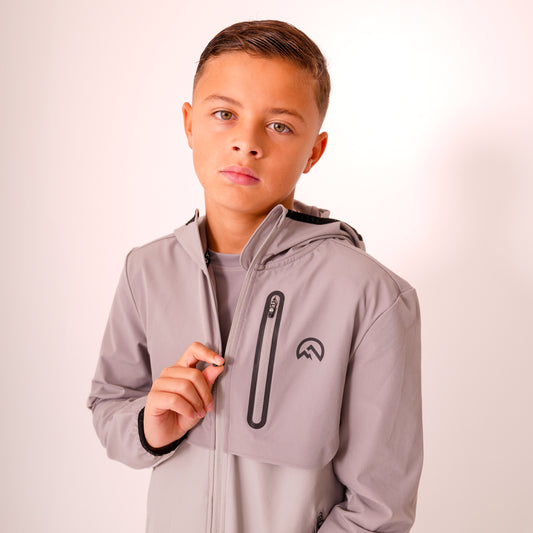 Junior AW25 Versatility Jacket - Concrete