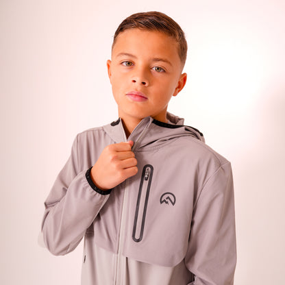 Junior AW25 Versatility Jacket - Concrete