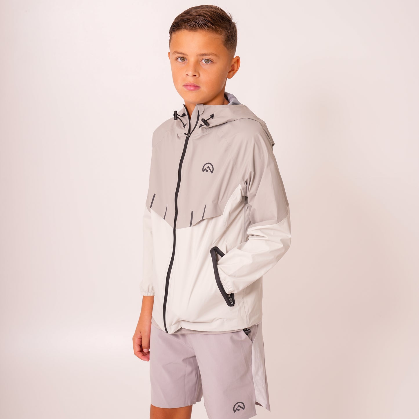 AW25 Junior Waterproof Madge Jacket - Light Grey/Concrete/Silver