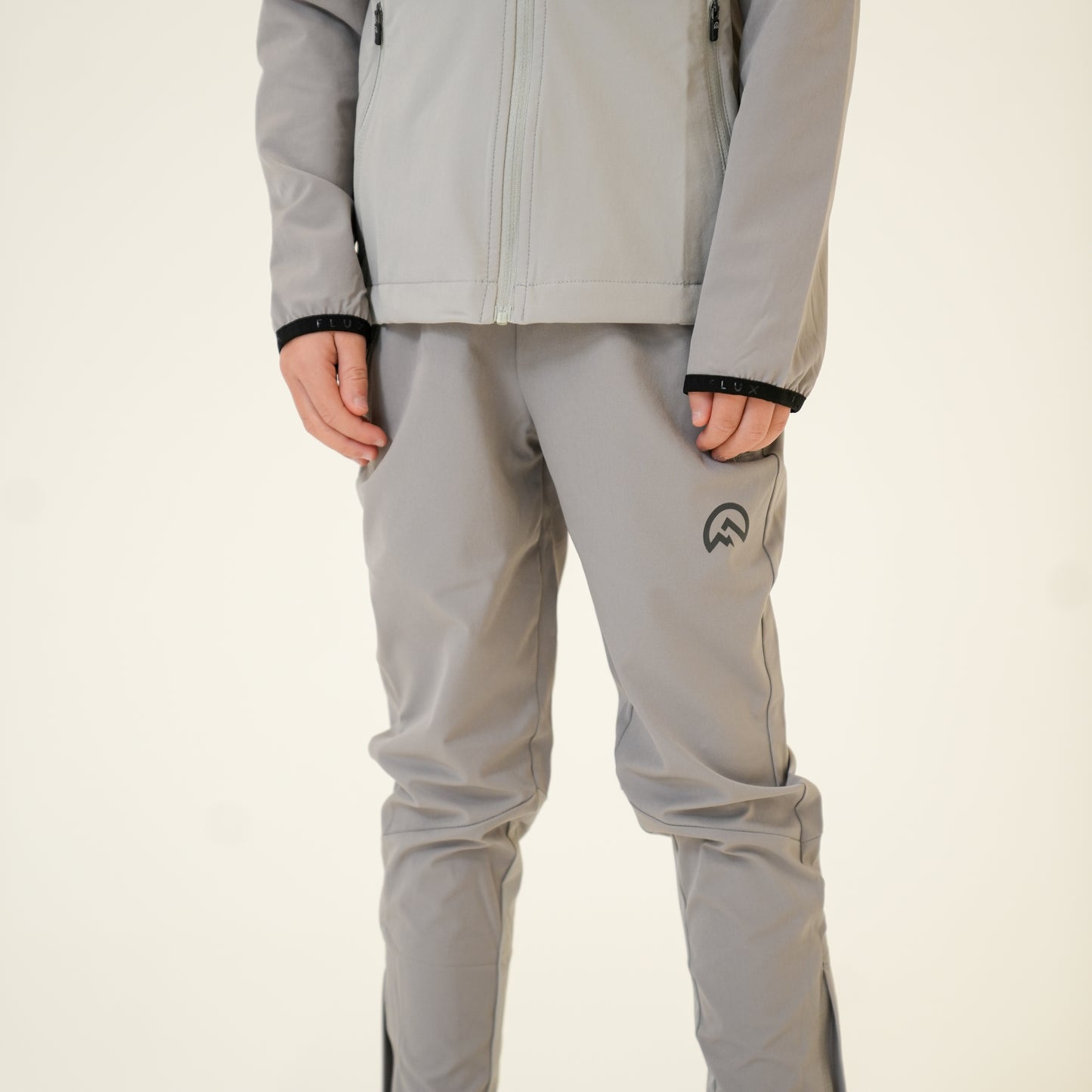 Junior AW25 Versatility Jacket - Concrete