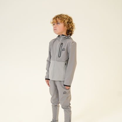 Junior AW25 Versatility Jacket - Concrete
